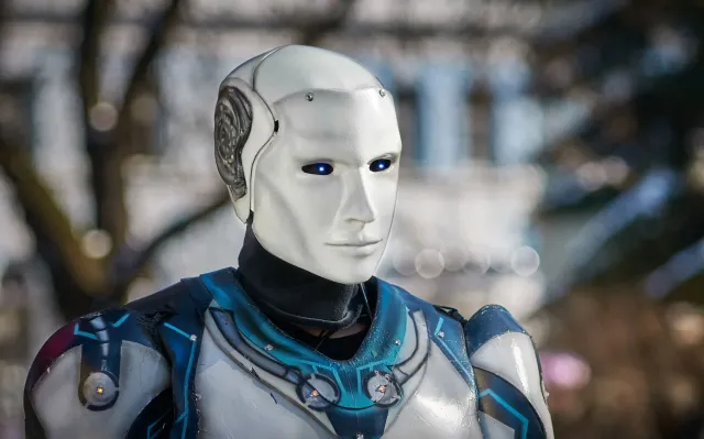 Robot tetun Android ho teknolojia foun iha loron foun, iha fundo neon, hanesan Android Show 2026