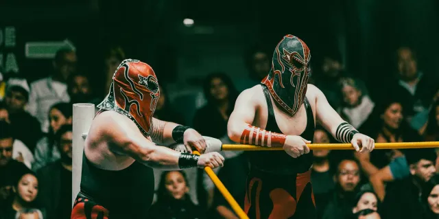 Imajen konseituál hatudu AI, krimi, no WWE hanesan simbolu tolu husi mundu modernu