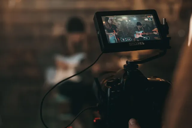 Mudansa boot iha mundu entretenimentu ho filme, música, no AI iha 2025, hatudu indústria ne'ebé transforma